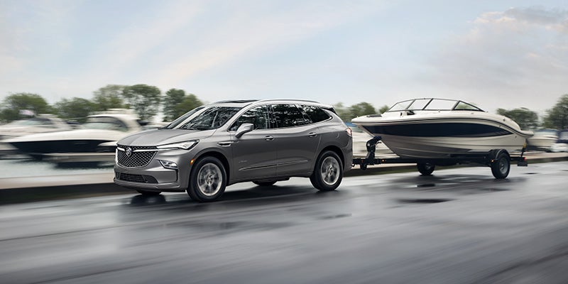 A 2020 Lincoln Enclave is towing a boat