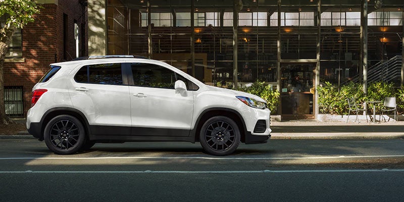 Trax Vehicle Parked on a Road in Front of a Building